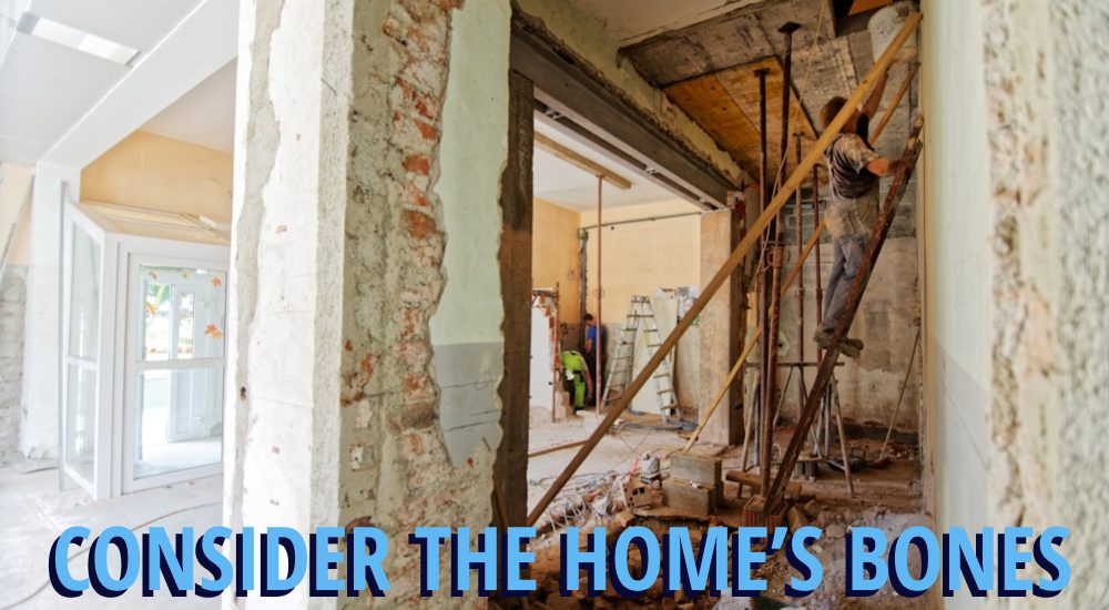 Remodeling in Tacoma’s Stadium District, Browns Point & Old Town Neighborhoods: You NEED to Know This Before You Start 1 Home in the middle of a remodel with a wall opened up, caption reading 'consider the homes bones'